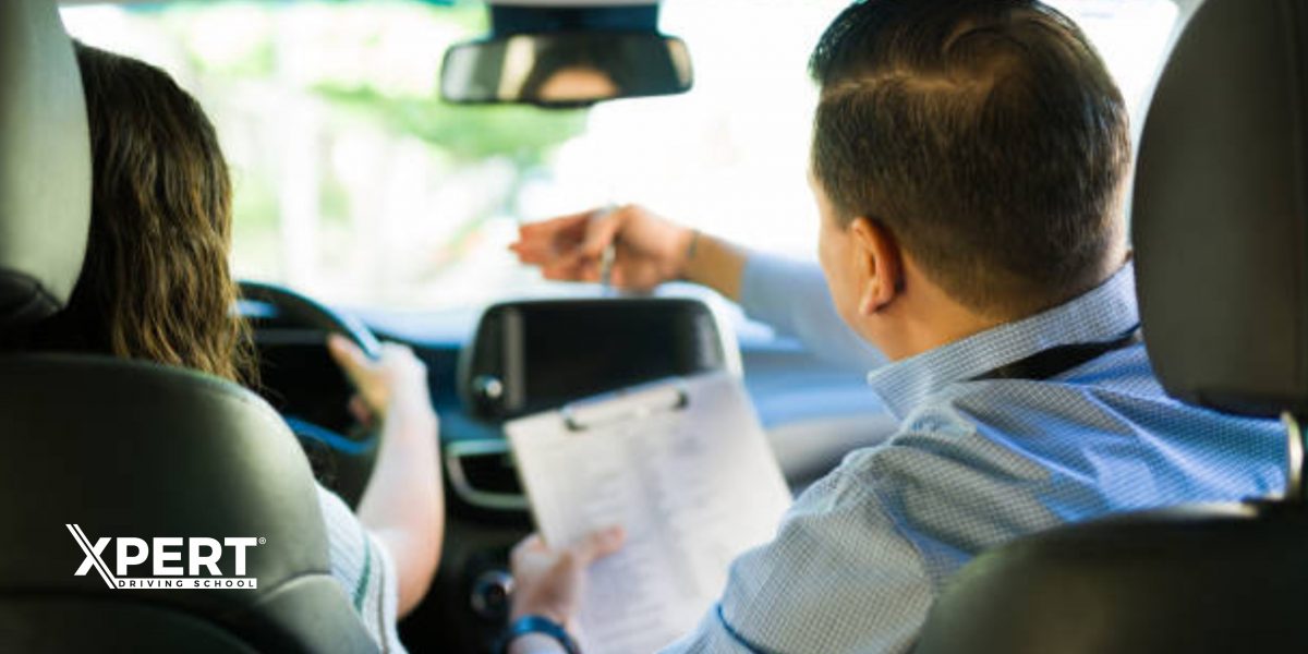 Driving instructor giving guidance to a learner driver during a driving lesson